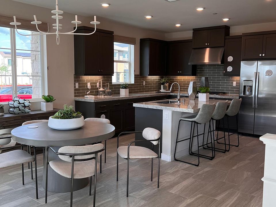 Kitchen with eat in island and dining area