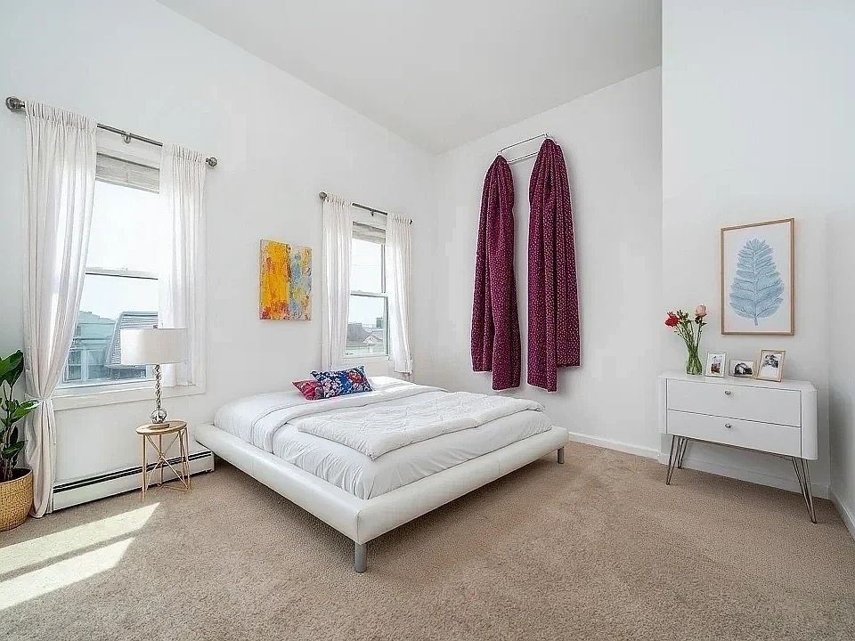 bedroom 1 - closet behind dresser - virtually staged