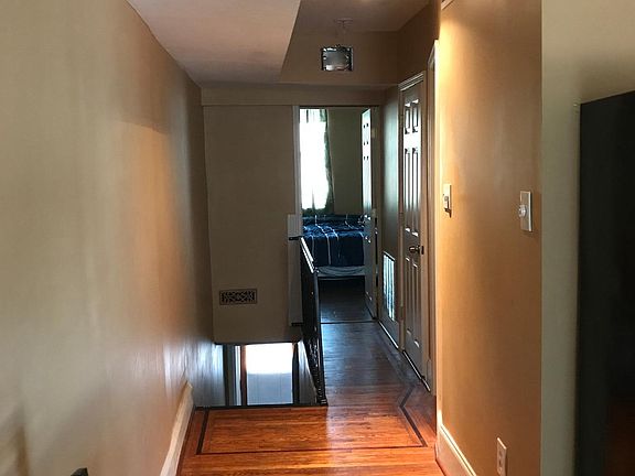 Hallway leading to the bdrm, office and bathroom 