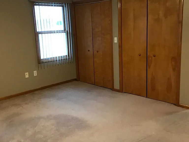 Master bedroom (his & her closet)