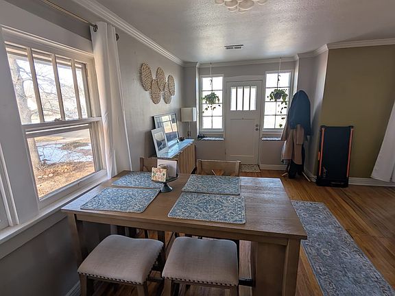 Dining room with custom chandelier