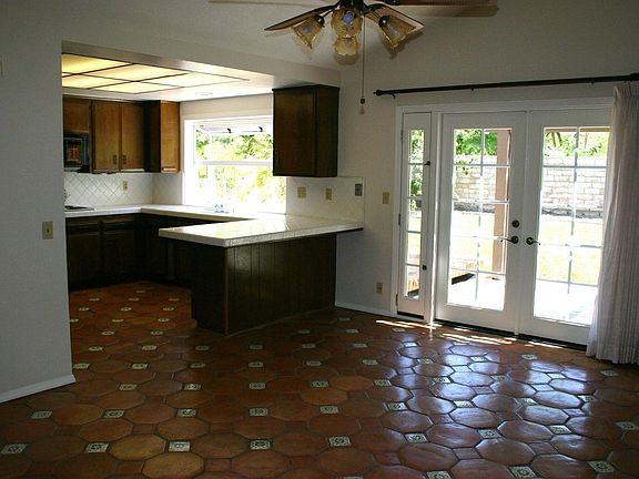 Family room and kitchen eating area.