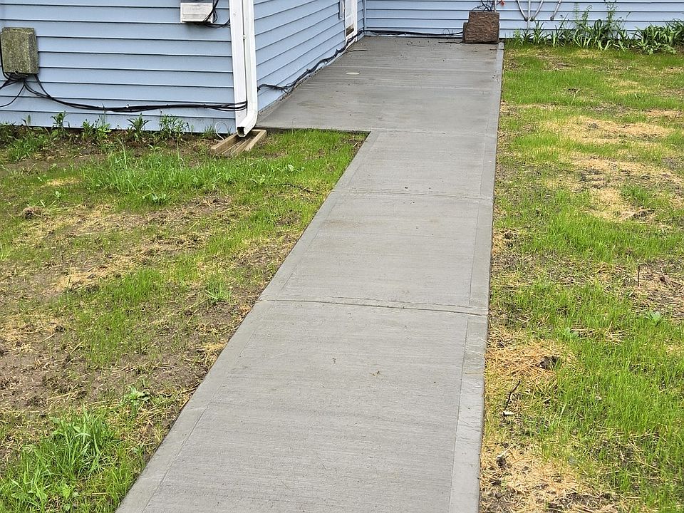 Updated picture of patio facing a beautiful mountain and as you can see this is where the grass is currently in growth it should be fully back very soon to the way it originally was. It is in its current state because of the patio/walkway construction.