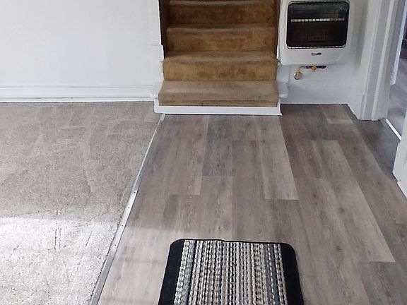 Living room area to upstairs