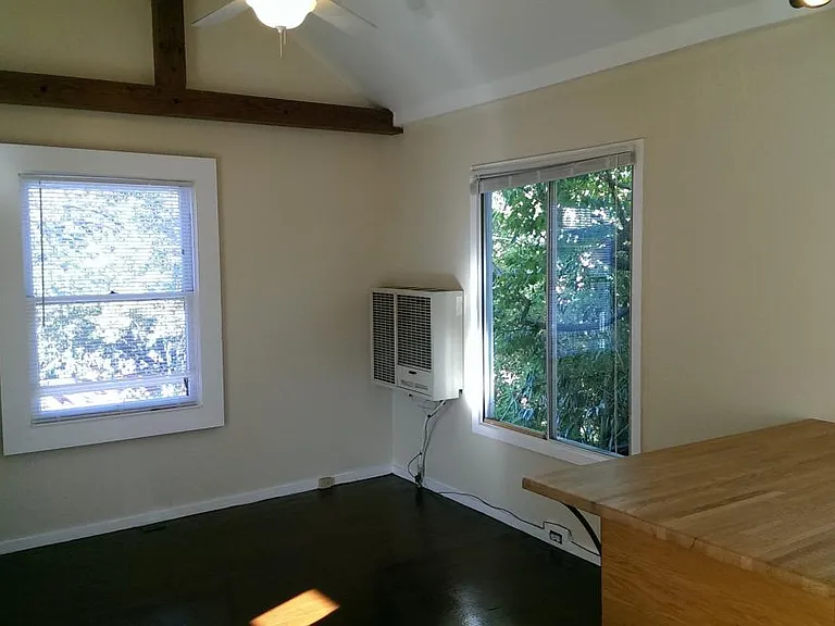 living room with vaulted ceiling