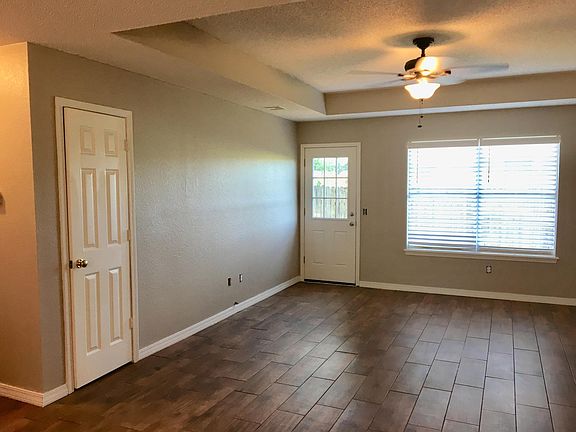 Freshly painted, new door, new wood window blinds