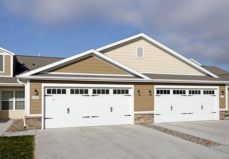 Charming Neighborhood Setting with Two-Car Garages