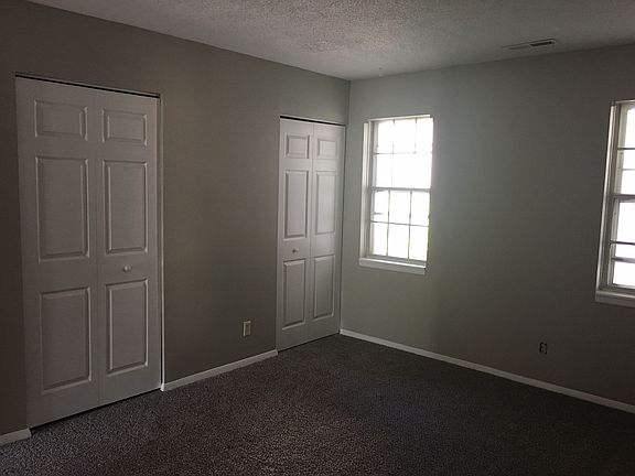 2nd image of 6938 NW Chapel Woods Ln