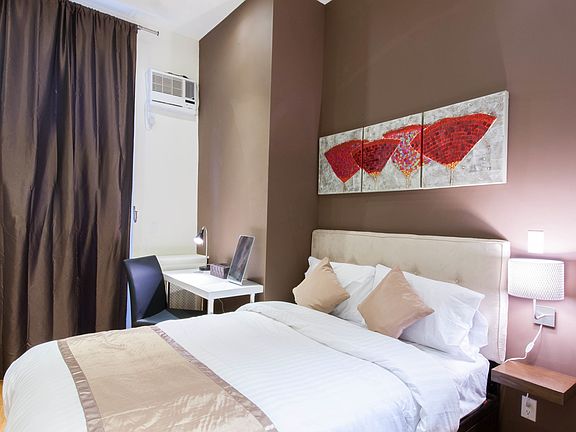 Luxurious bed with plush linens