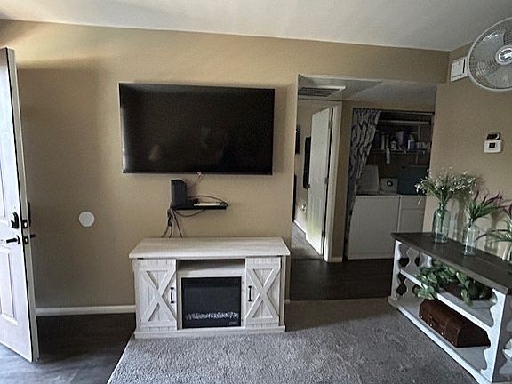 Smart TV and electric fireplace.