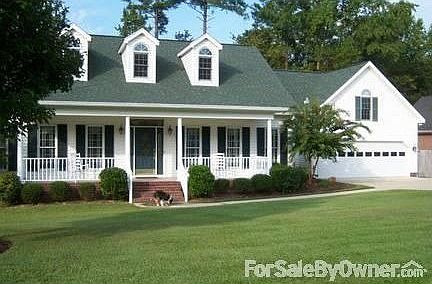 Exterior : Lowcountry style house with hip roof. Architectural shingles