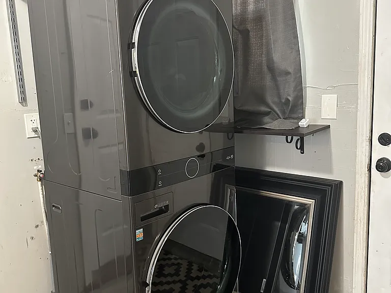Stacked Samsung washer and dryer