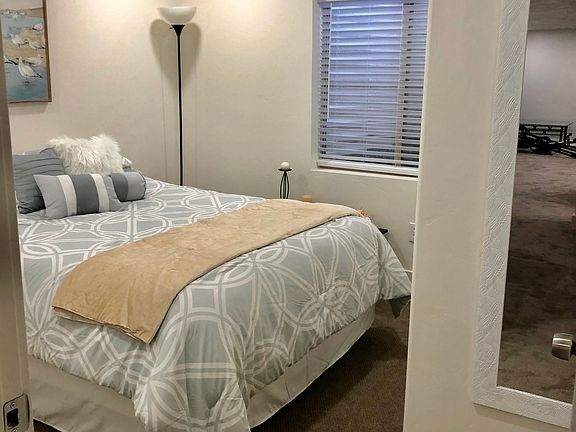Bedroom with queen size bed_mattress included & some furnishings_ bedding also available if desired.