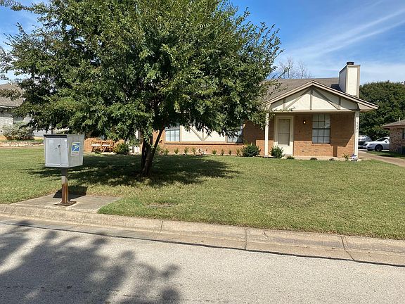 Front street view with driveway