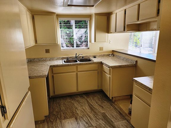 Kitchen with pass through to the living room