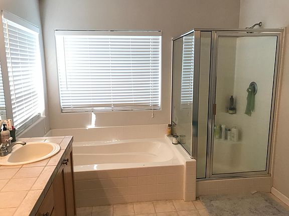 Master Bath with dual sinks, tub and shower