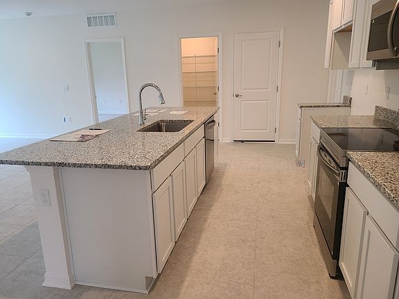 3rd image of 61 Rickenbacker Dr