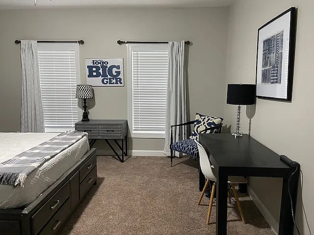 In room desk and sitting area for remote work days.
