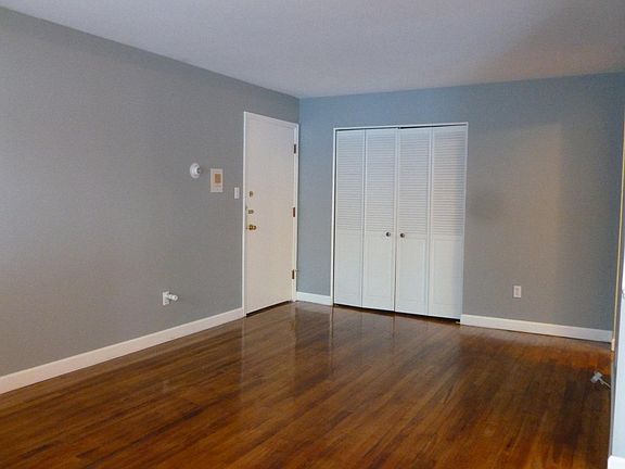 Living room, unit entrance & closet doors