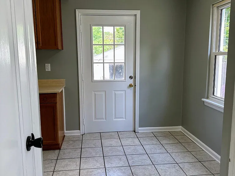 Kitchen with back door to back patio
