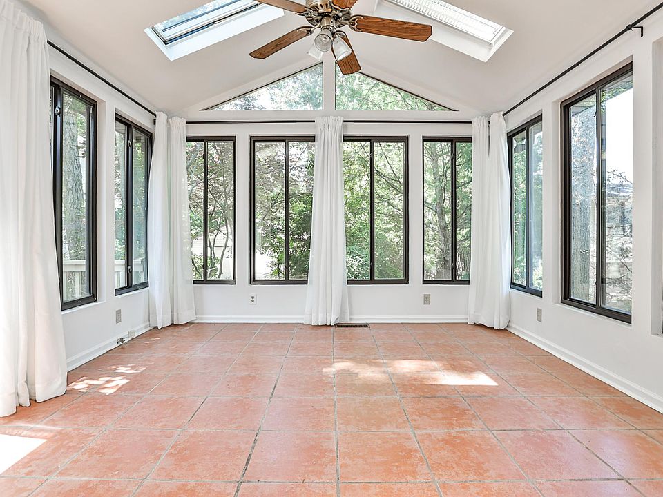 sun room, with screened windows and skylights