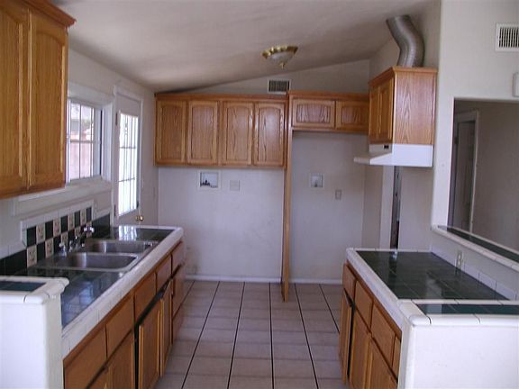 Clean Kitchen With Oak Cabinets