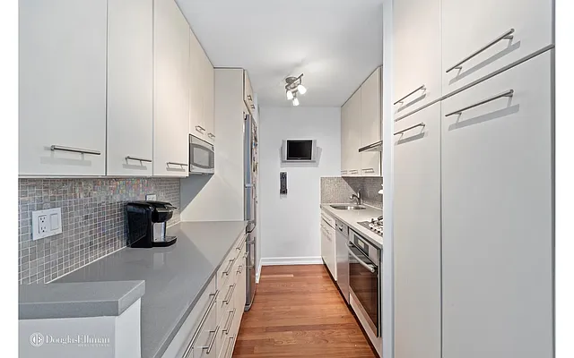 Sold by Douglas Elliman | media 9