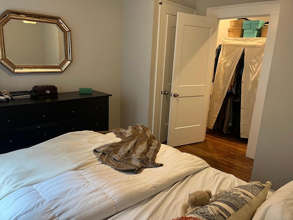 Bedroom with view into hallway