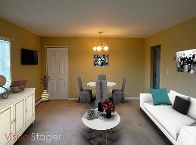 SPACIOUS LIVING ROOM + DINING AREA