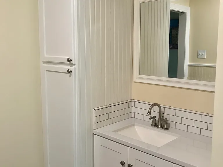 main bathroom vanity & towel cabinet