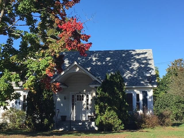 Front of House with Foliage
