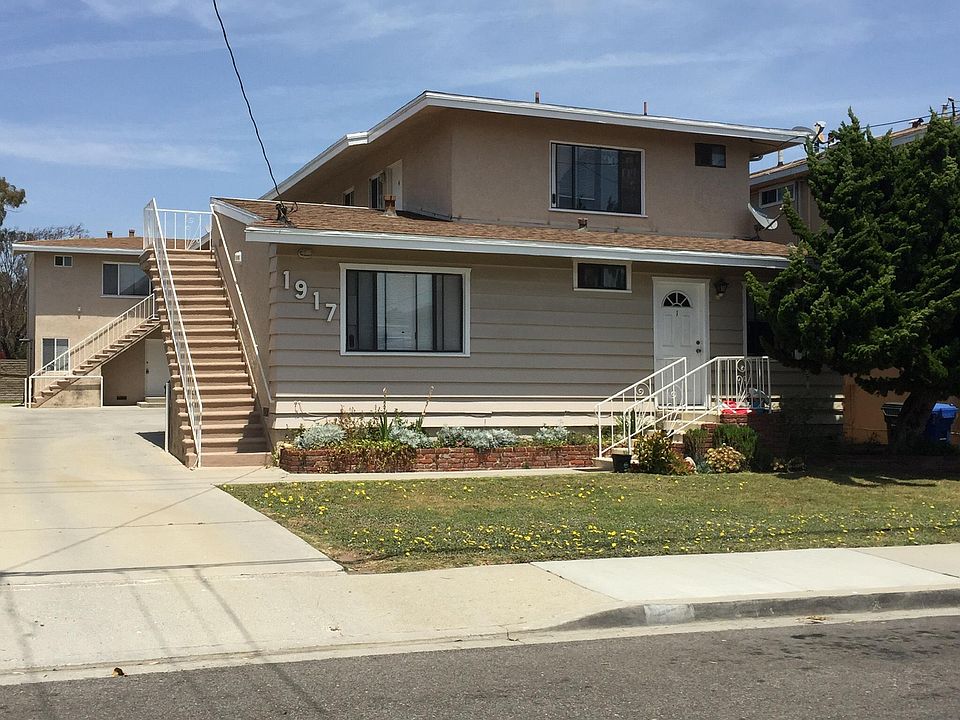 8 UNIT APARTMENT BUILDING LOCATED ON A QUIET STREET WITH PRIVATE GARAGES FOR ALL TENANTS