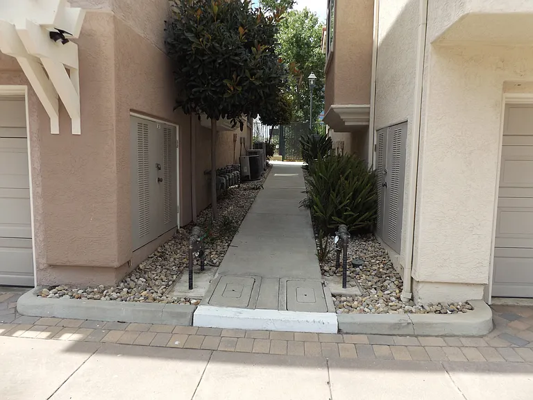 Walkway towards pedestrian gate to the Riverwalk