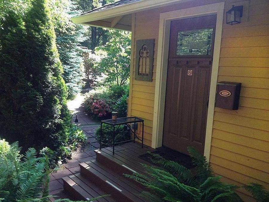 Landscaped walk and front door.
