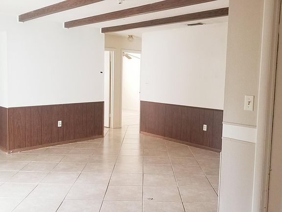 family room in back with sliders to back patio