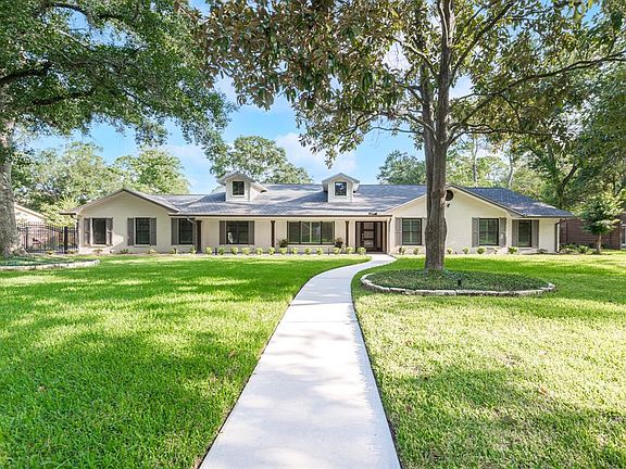 The front porch runs across the front of the home--giving you a hint of the inviting warmth you will find inside.