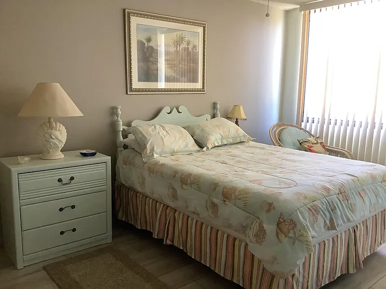 Master bedroom with large walk in closet, en suite bathroom and tv