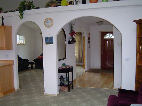 First and Second living Rms with Archways