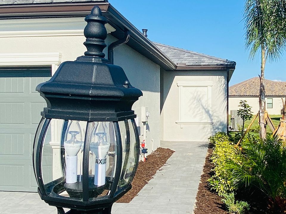Front door is private and protected with overhang
