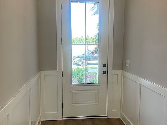 Foyer with wainscoting.