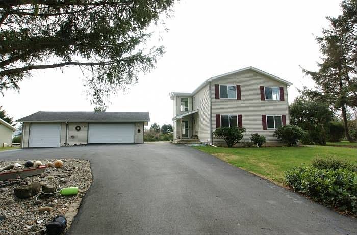 Home w/3 car garage.