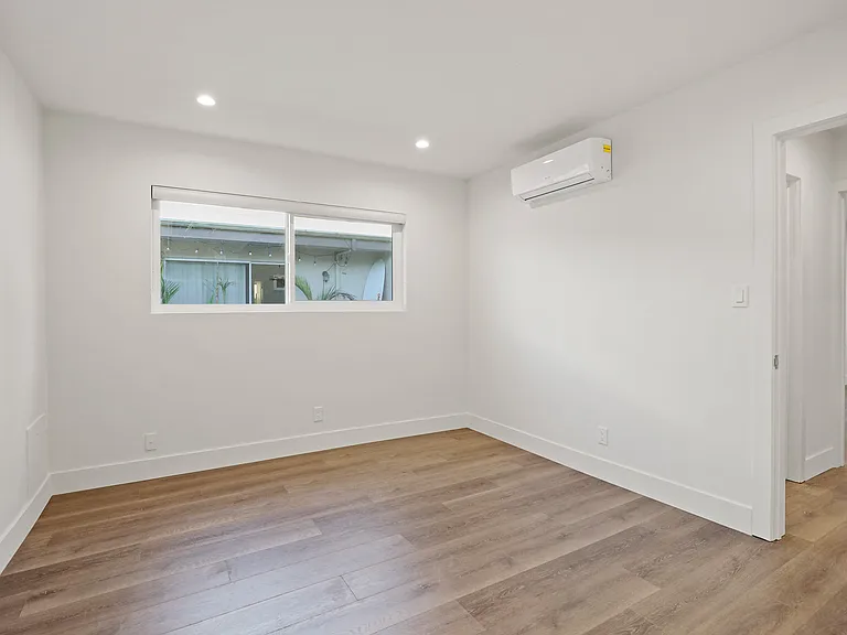 Bedroom with Wall Heater