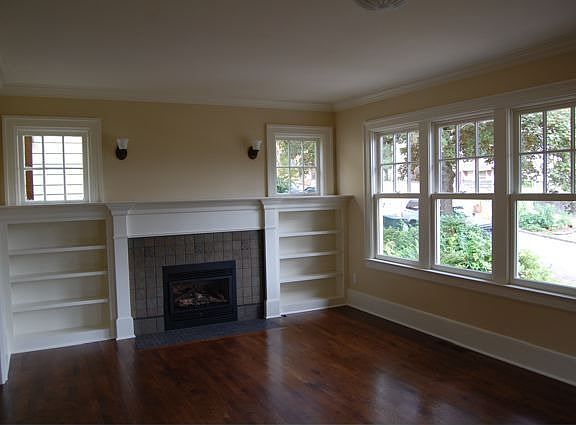 Living Room with gas fireplace and period tile