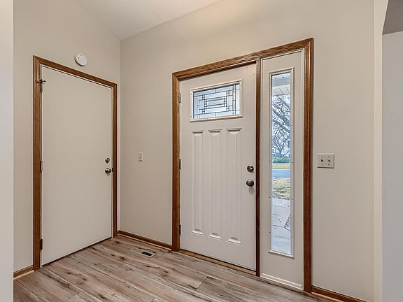 Welcome home to new wood/vinyl flooring.