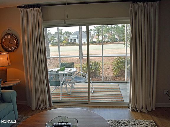 4th image of 3350 Club Villa Dr SE Unit 1001