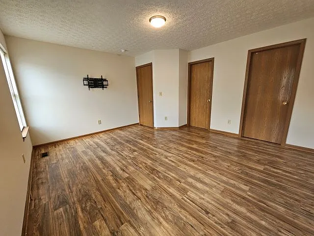Another angle view of 1st floor bedroom, new LED light fixture.