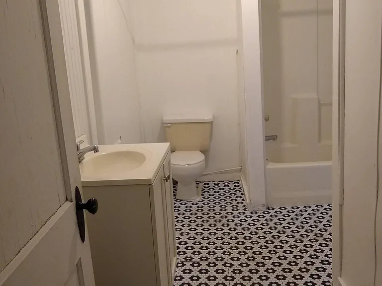 Full Bath - tub,shower combination; room for tenant cabinet.