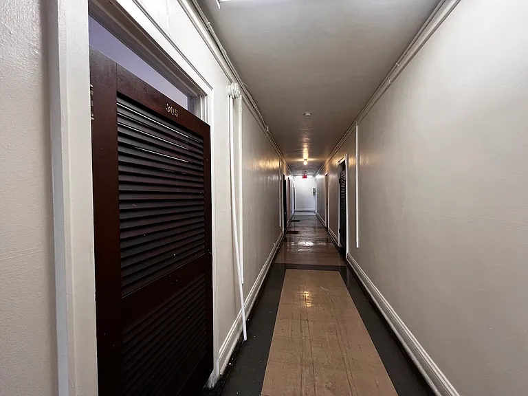 Looking Eastward towards the interior stairwell.