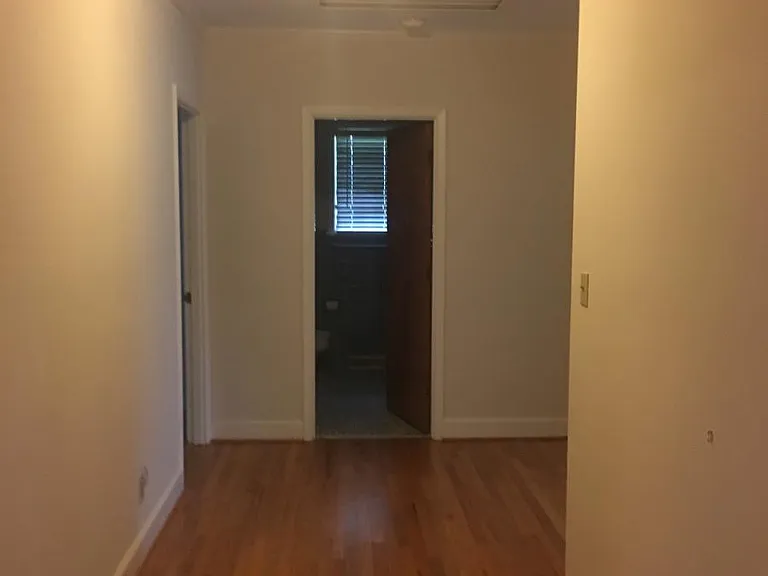 hallway to right of front door leading to bedrooms