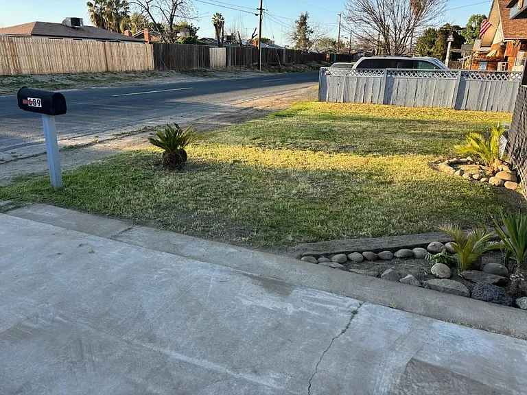 plenty of room to park cars in the front of the house, across the street, or in the driveway.